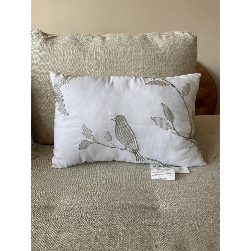 White lumbar throw pillow with gray embroidered birds, 8 inches X 14 inches